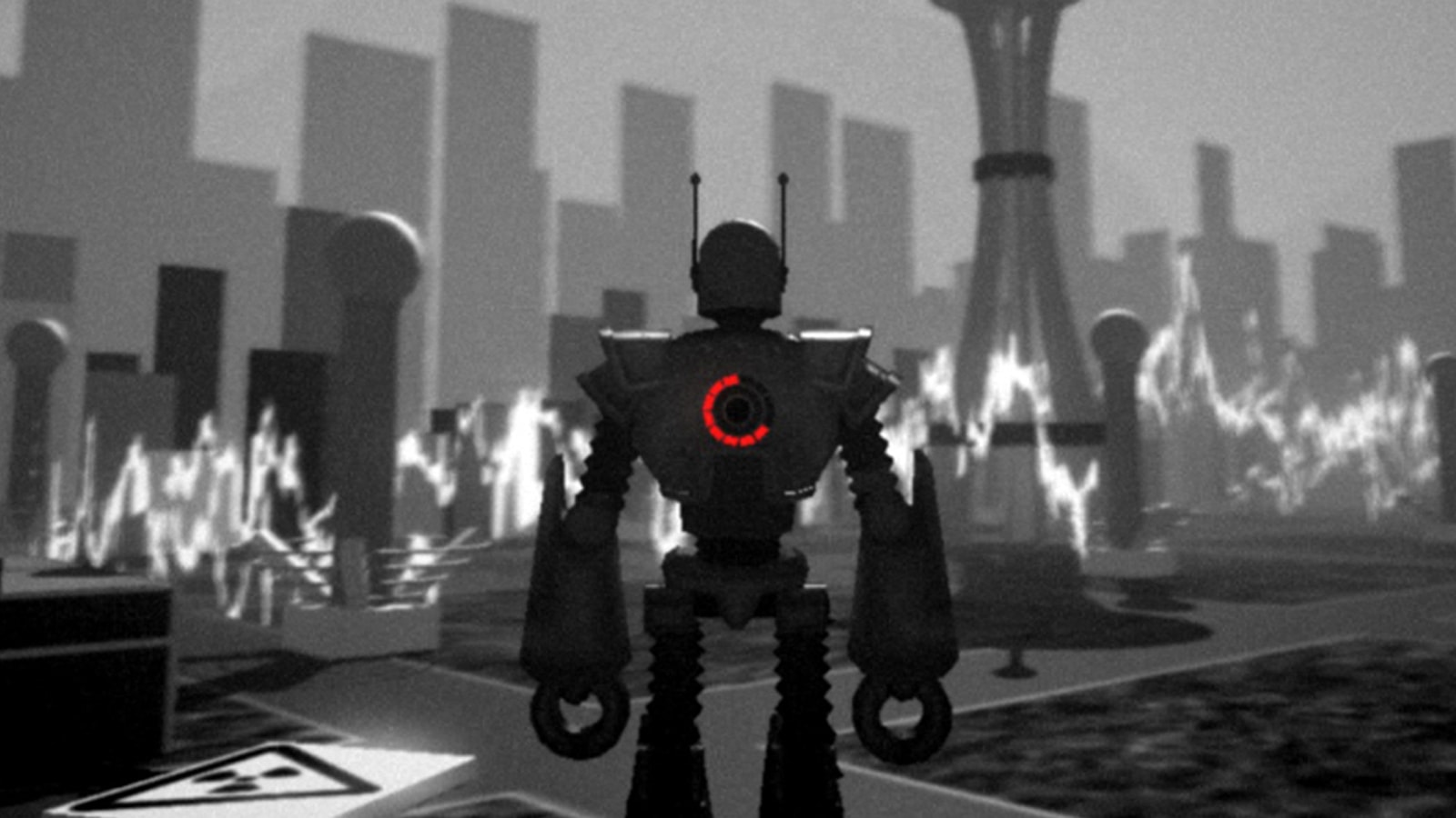 The backside of a large robot with two claw-like hands and a red light-up meter on it.