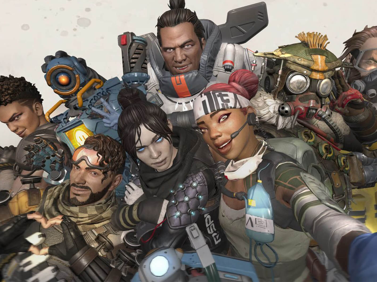 The characters from Apex Legends pose for a selfie.