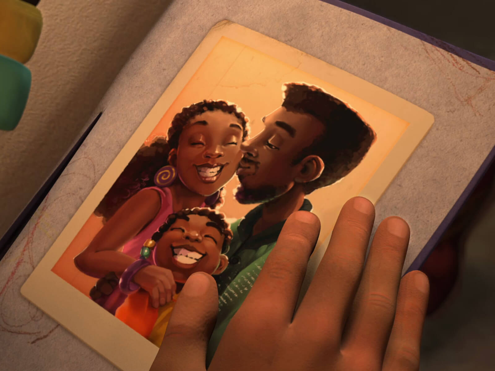 Screen capture from the student film Adija. A young girl looks at a happy family photograph.