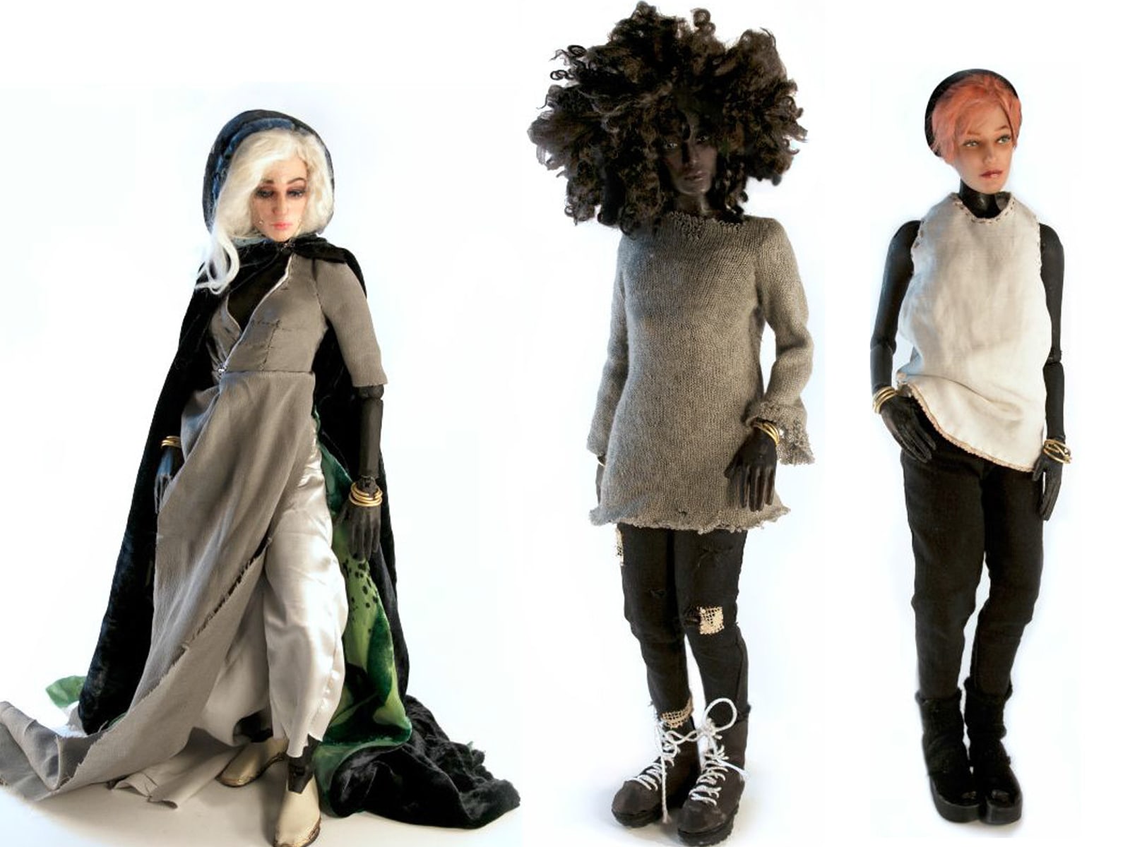 Isabel's action figures are dramatically swathed in layers of natural fabric