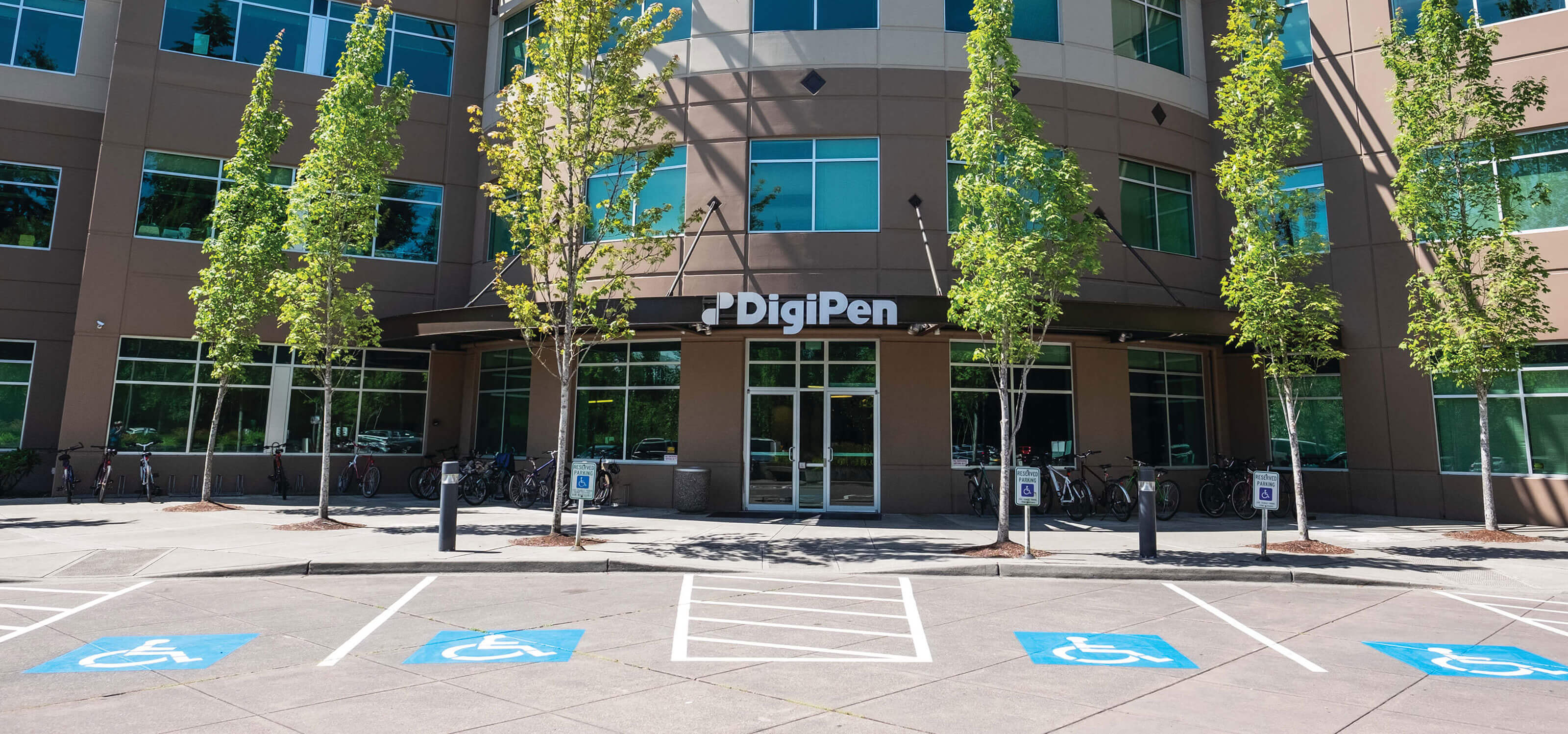 A photo of the DigiPen main entrance taken on a sunny day