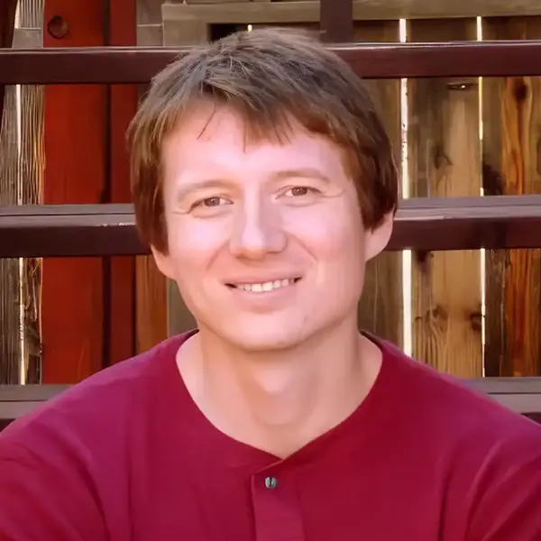 Headshot of Roman Timurson.