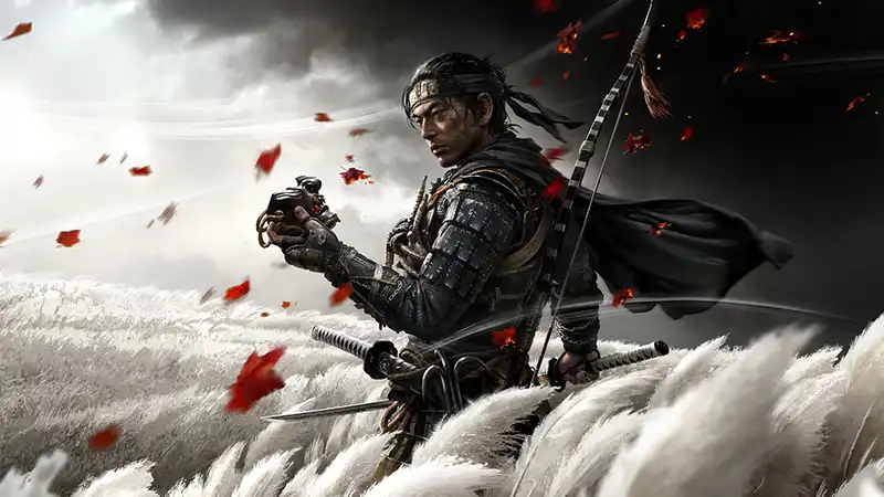 Ghost of Tsushima artwork: A samurai in a field holds a mask while leaves blow in the wind.