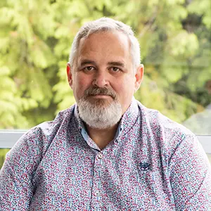 Headshot of Program Director Barnabas Bede.
