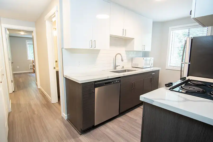 Kitchen with sink and appliances.